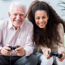 Daughter and Father-in-Law Playing Video Game